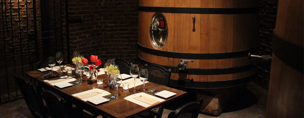 Table set for tasting in barrel room